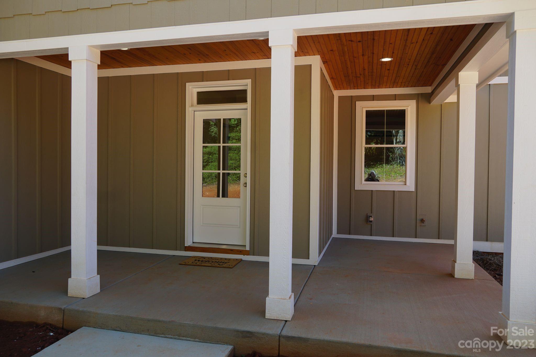 1495 Golf Course Road Columbus, NC 28722 - Photo 11 of 47 a view of front door of house