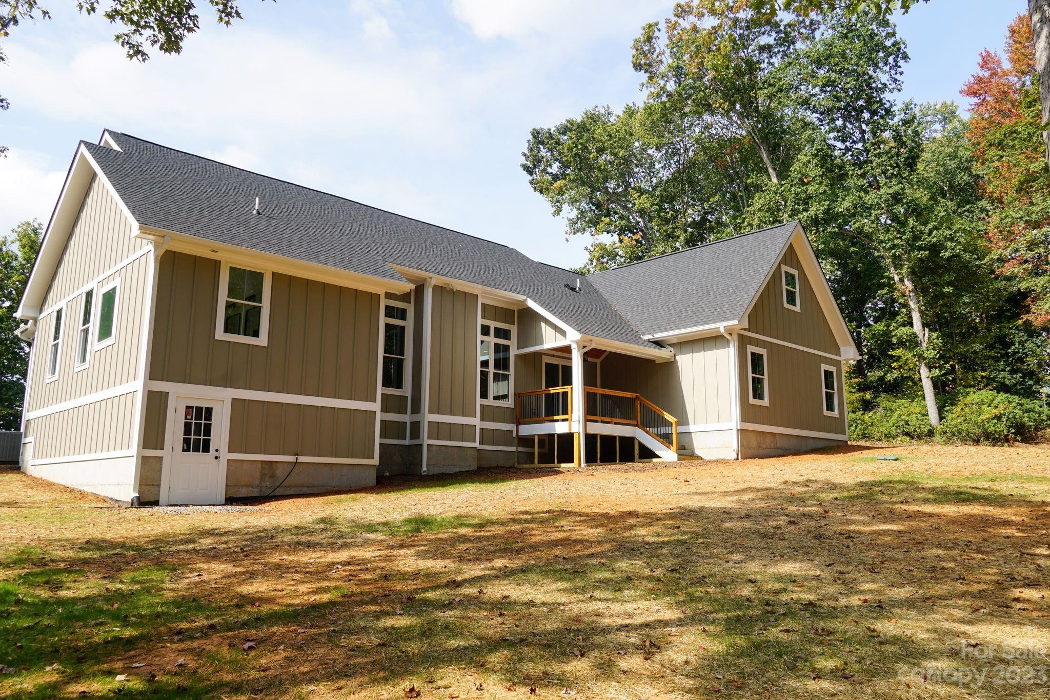 1495 Golf Course Road Columbus, NC 28722 - Photo 12 of 47 a house with yard in front of it