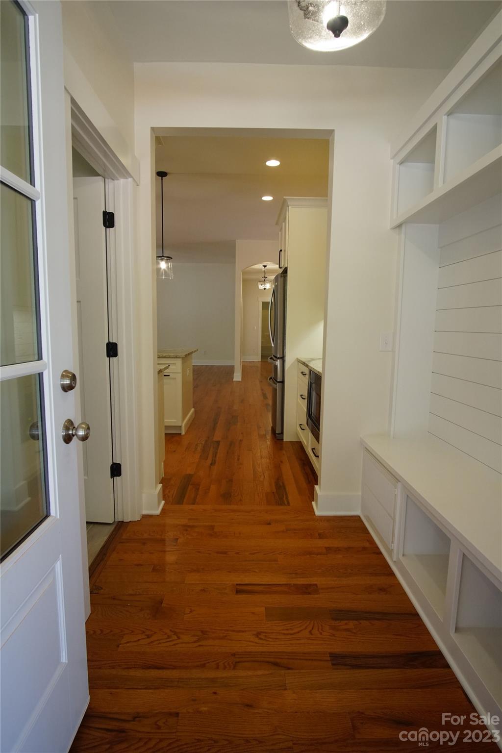 1495 Golf Course Road Columbus, NC 28722 - Photo 23 of 47 a large bedroom with a bed and wooden floor