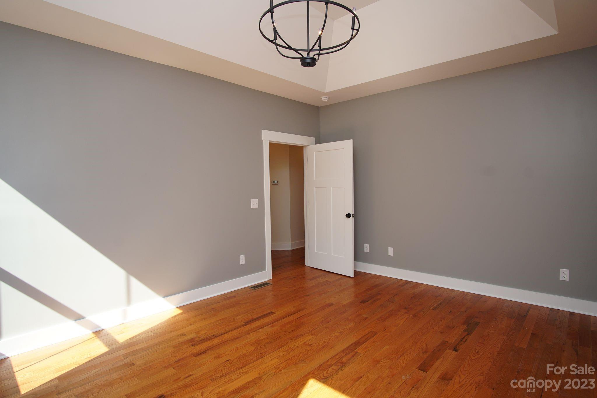 1495 Golf Course Road Columbus, NC 28722 - Photo 30 of 47 a view of empty room with wooden floor