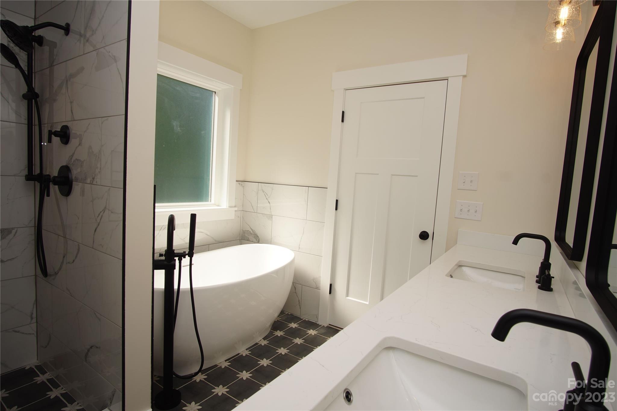 1495 Golf Course Road Columbus, NC 28722 - Photo 35 of 47 a bathroom with a sink and a mirror