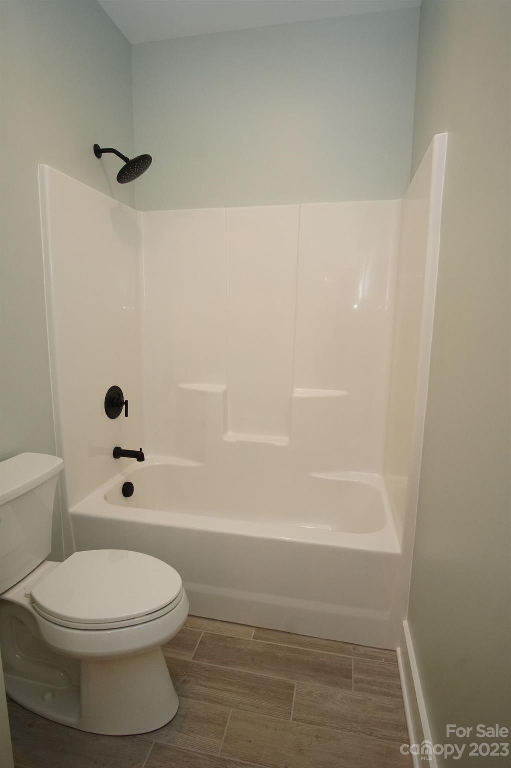 1495 Golf Course Road Columbus, NC 28722 - Photo 38 of 47 a bathroom with a toilet and a shower