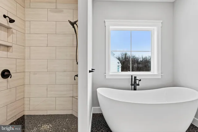a bathroom with a sink and a window