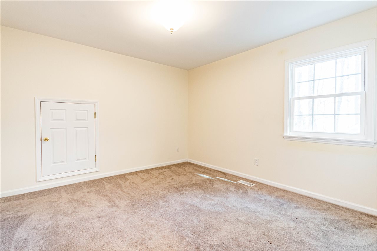 6504 Hammersmith Drive Raleigh, NC 27613 - Photo 20 of 30 Bedroom #4 with Storage attic