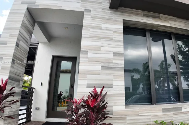 a car parked in front of a house