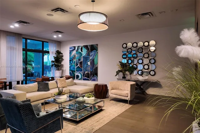 a room with furniture pool table table tennis window