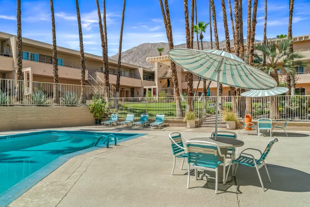 a view of a building with a swimming pool
