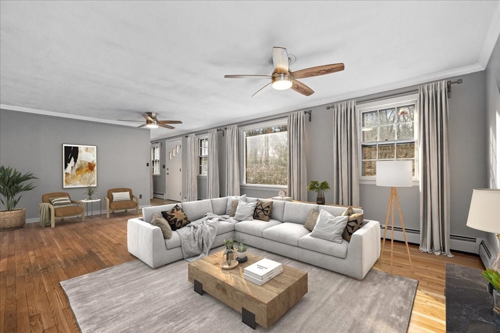 346 Long Hill Road Bolton, MA 01740 - Photo 1 of 12 a living room with furniture and a large window