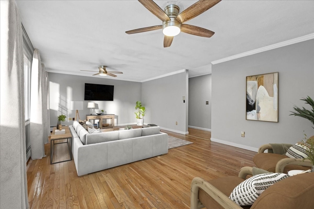 346 Long Hill Road Bolton, MA 01740 - Photo 2 of 12 a living room with furniture and a flat screen tv