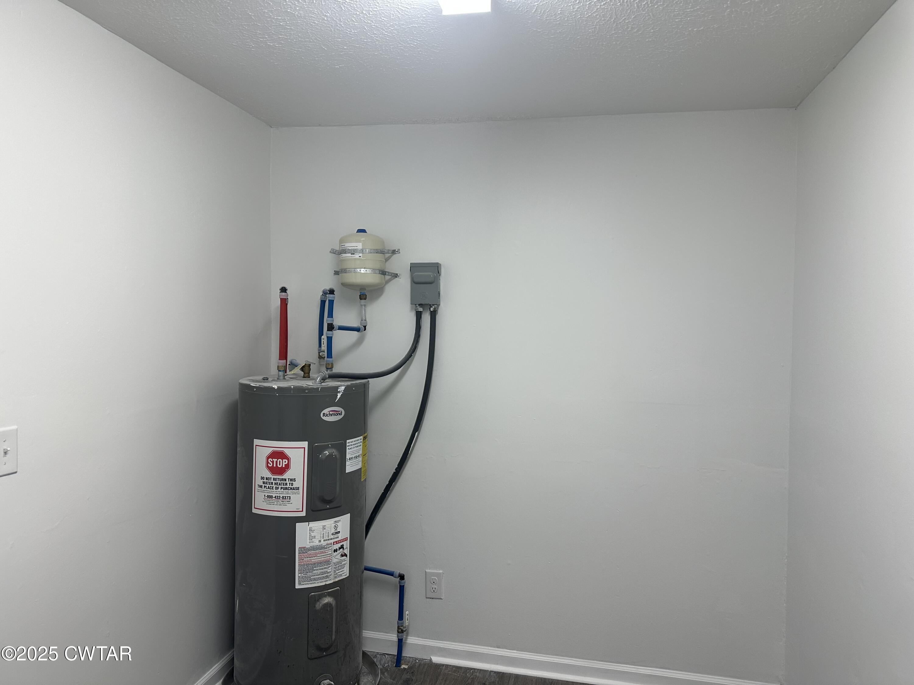 328 Baughn Street Henderson, TN 38340 - Photo 16 of 16 a room with storage and utility