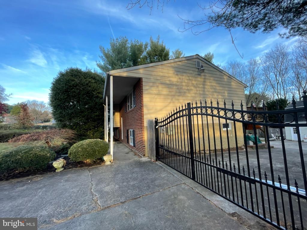 5929 Snowdens Run Road Sykesville, MD 21784 - Photo 2 of 54 Remote operated electric driveway gate