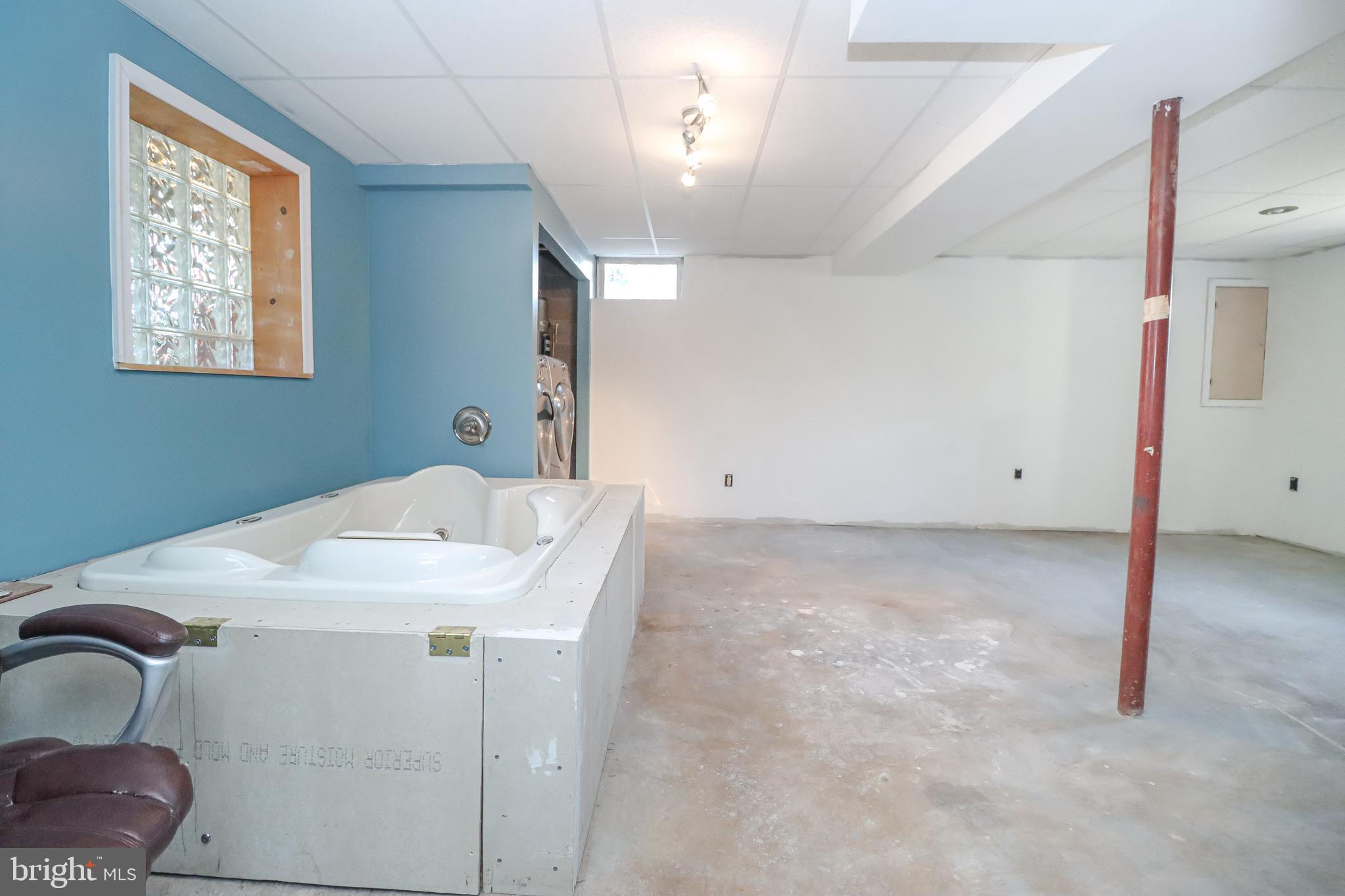 5929 Snowdens Run Road Sykesville, MD 21784 - Photo 30 of 54 Jetted, soaker bathtub in basement