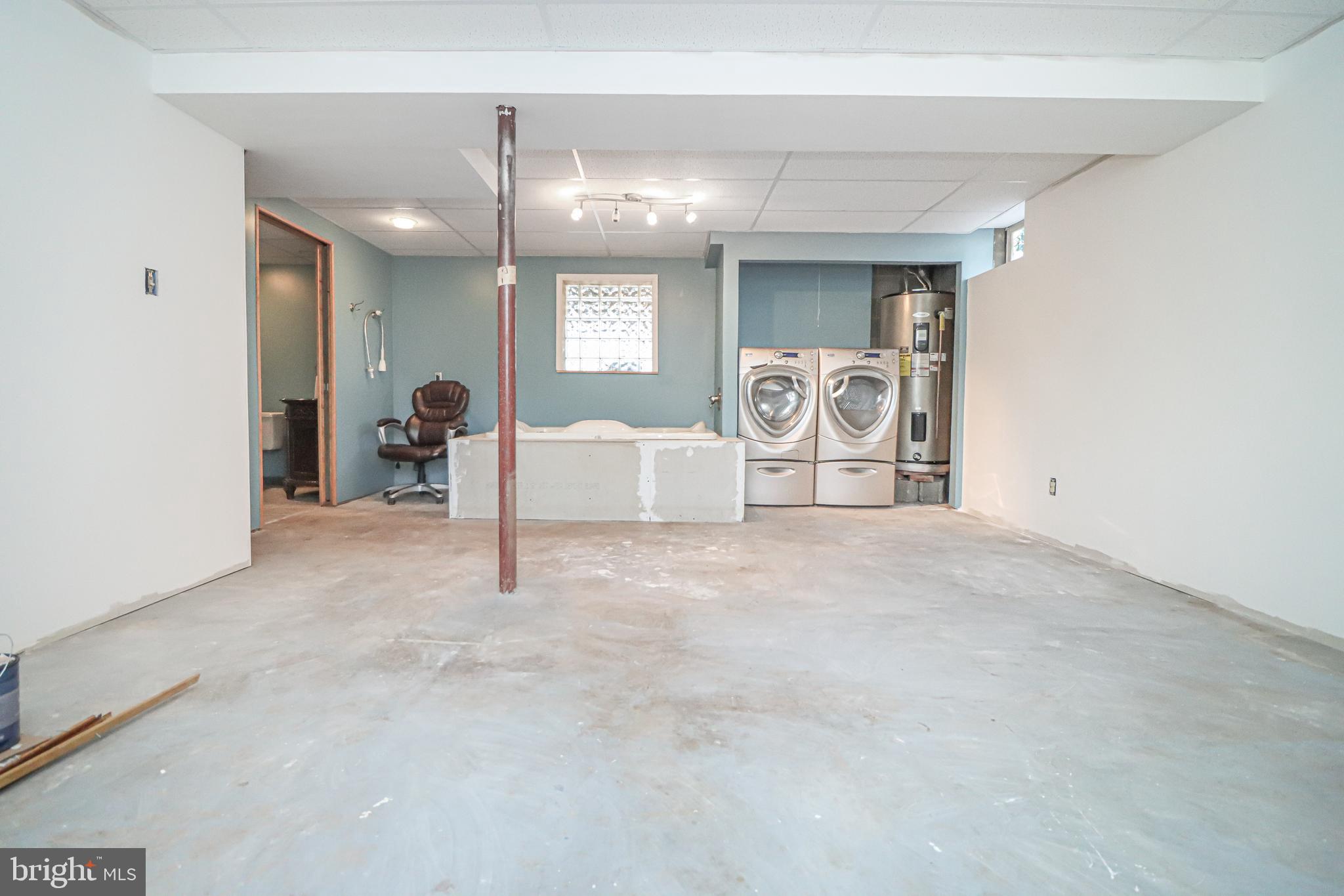 5929 Snowdens Run Road Sykesville, MD 21784 - Photo 33 of 54 Multiuse rm w/ laundry, bath, & lots of potential