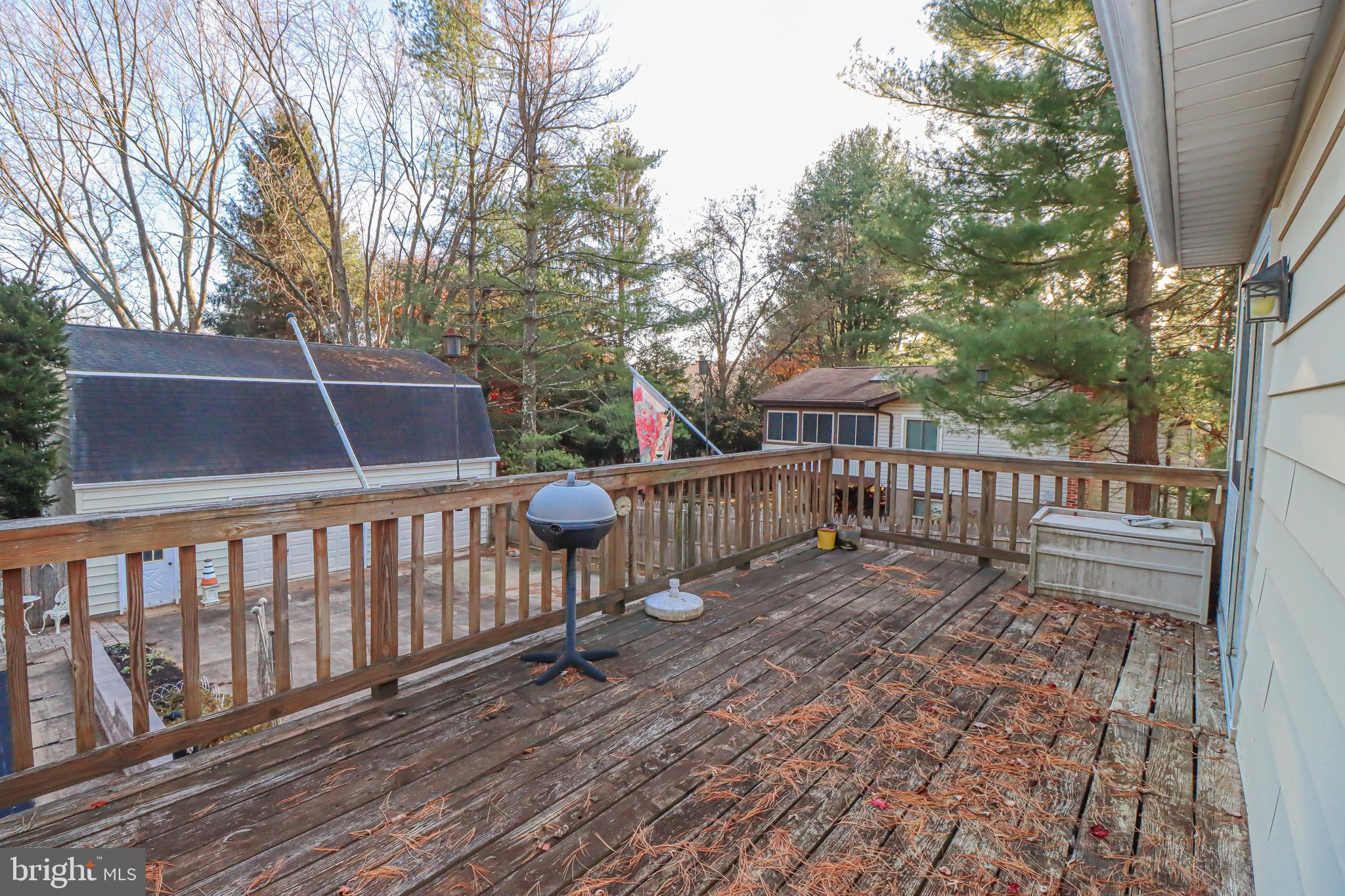 5929 Snowdens Run Road Sykesville, MD 21784 - Photo 34 of 54 Deck off dining rm overlooks fenced part of yard