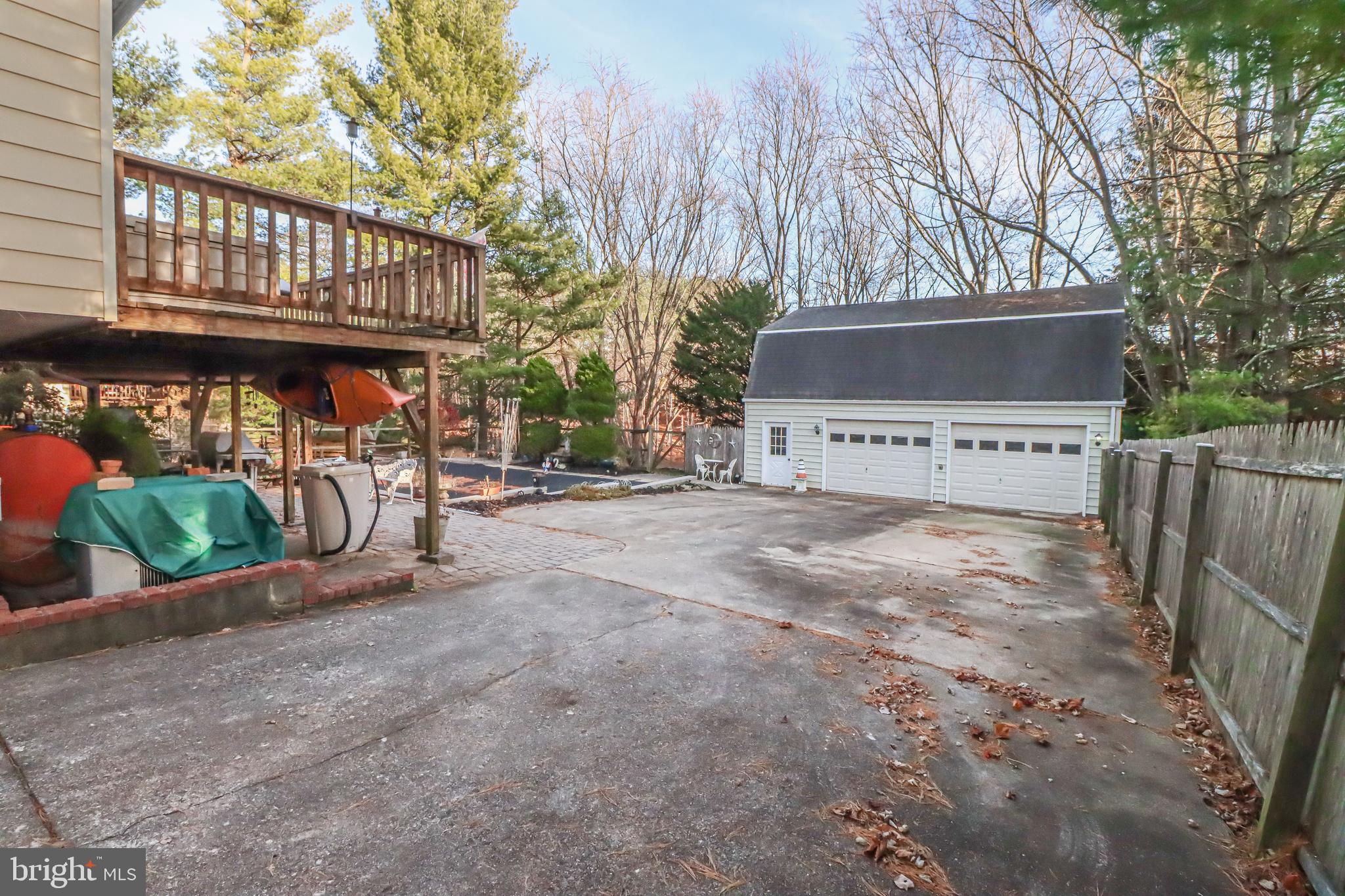 5929 Snowdens Run Road Sykesville, MD 21784 - Photo 44 of 54 View of the backyard from the driveway gates