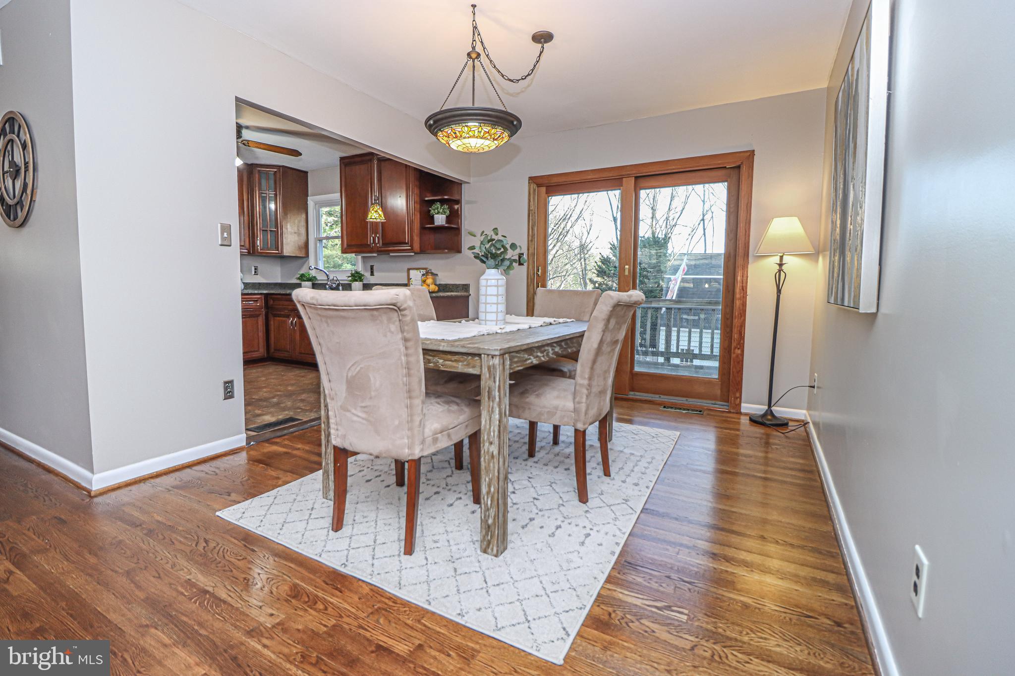 5929 Snowdens Run Road Sykesville, MD 21784 - Photo 7 of 54 Dining room with access to deck and overlooks yard