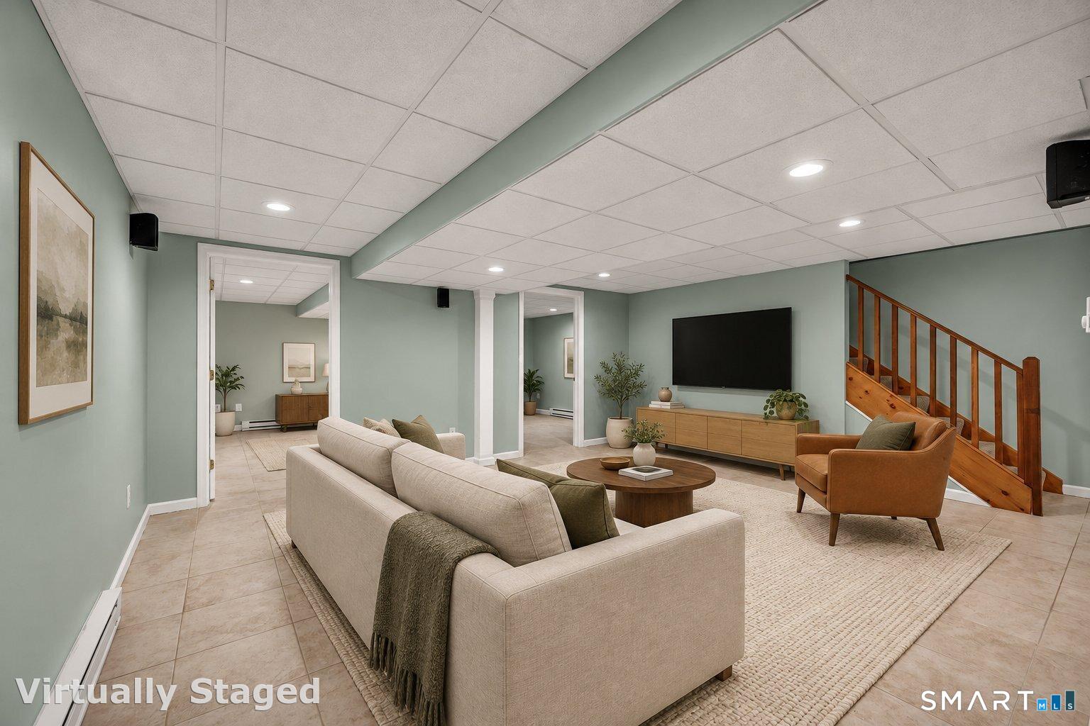 270 Copper Ridge Southington, CT 06489 - Photo 31 of 40 Lower-level family room with surround sound speakers.
