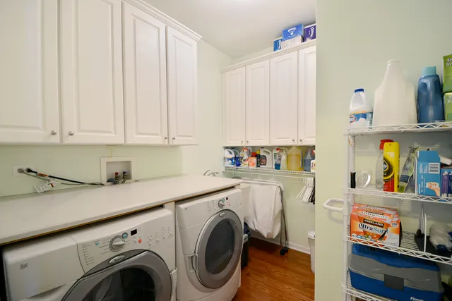 a view of kitchen sink and cabinets