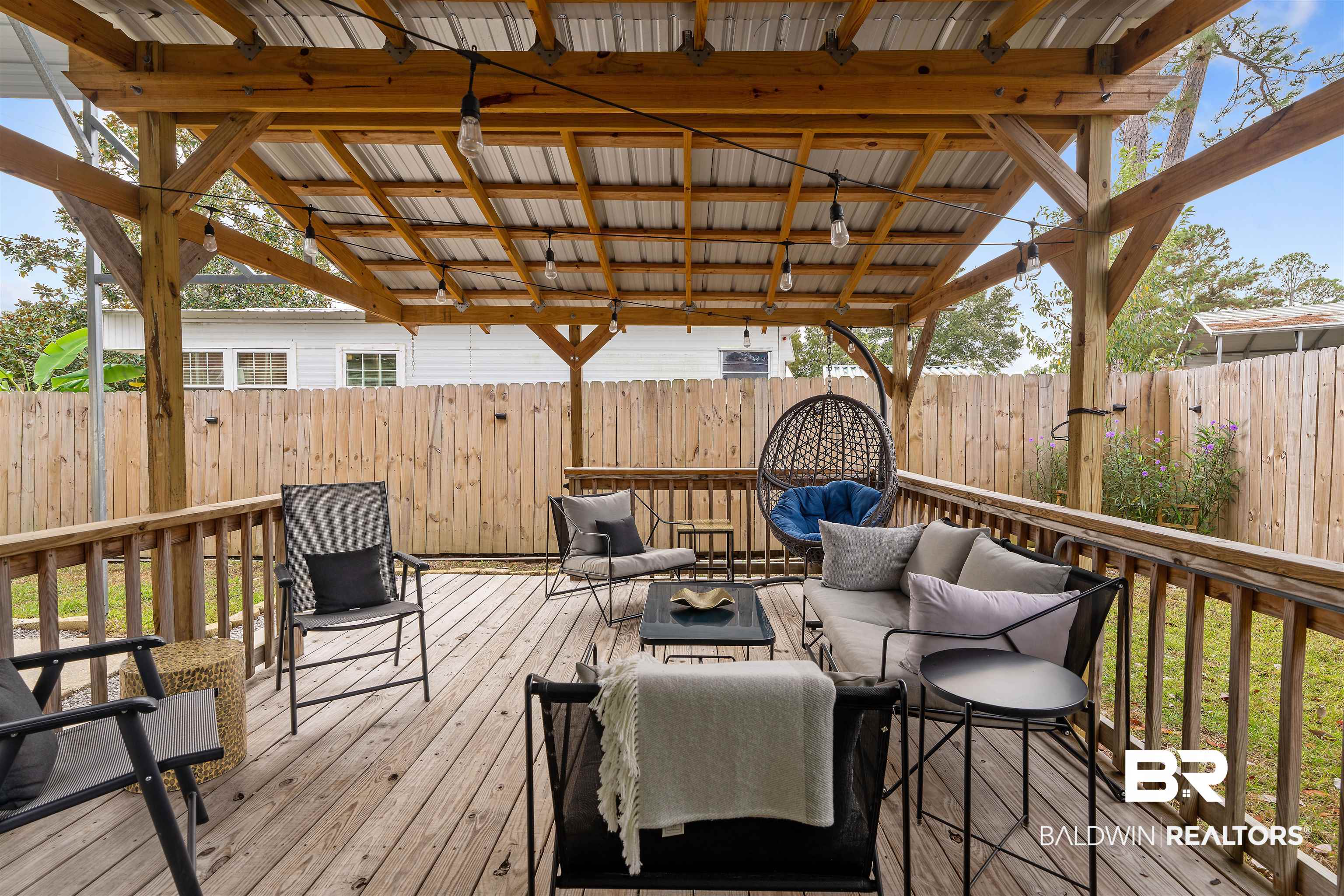 683 Escambia Loop Lillian, AL 36549 - Photo 18 of 27 Deck with an outdoor living space