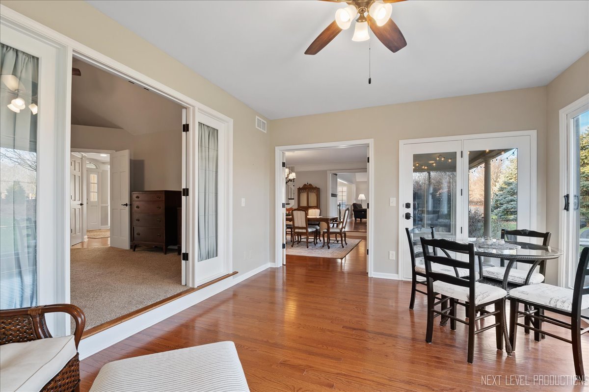 1521 Eagle Brook Drive Geneva, IL 60134 - Photo 12 of 41 a living room with furniture and wooden floor