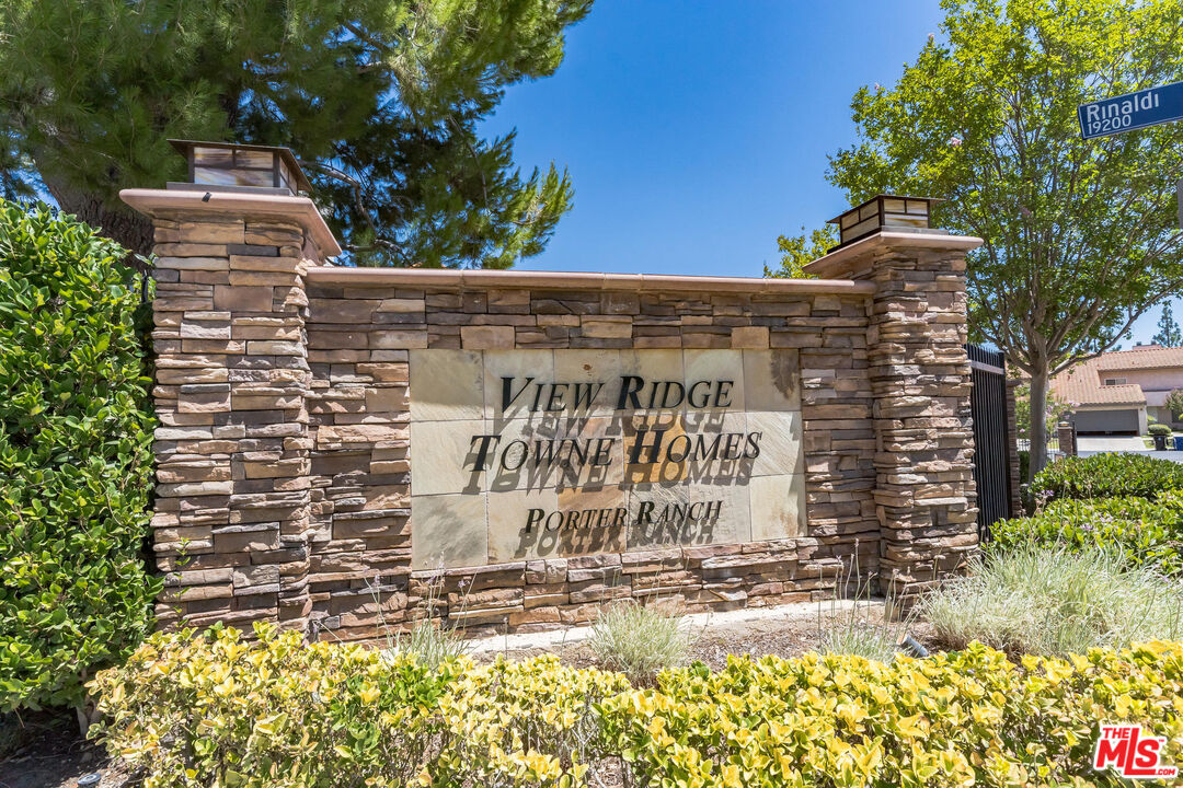 19127 Index Street, Unit 3 Porter Ranch, CA 91326 - Photo 4 of 18 a sign on the side of a building