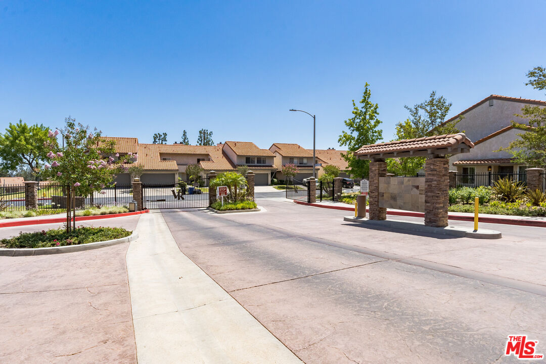 19127 Index Street, Unit 3 Porter Ranch, CA 91326 - Photo 5 of 18 a view of street with cars