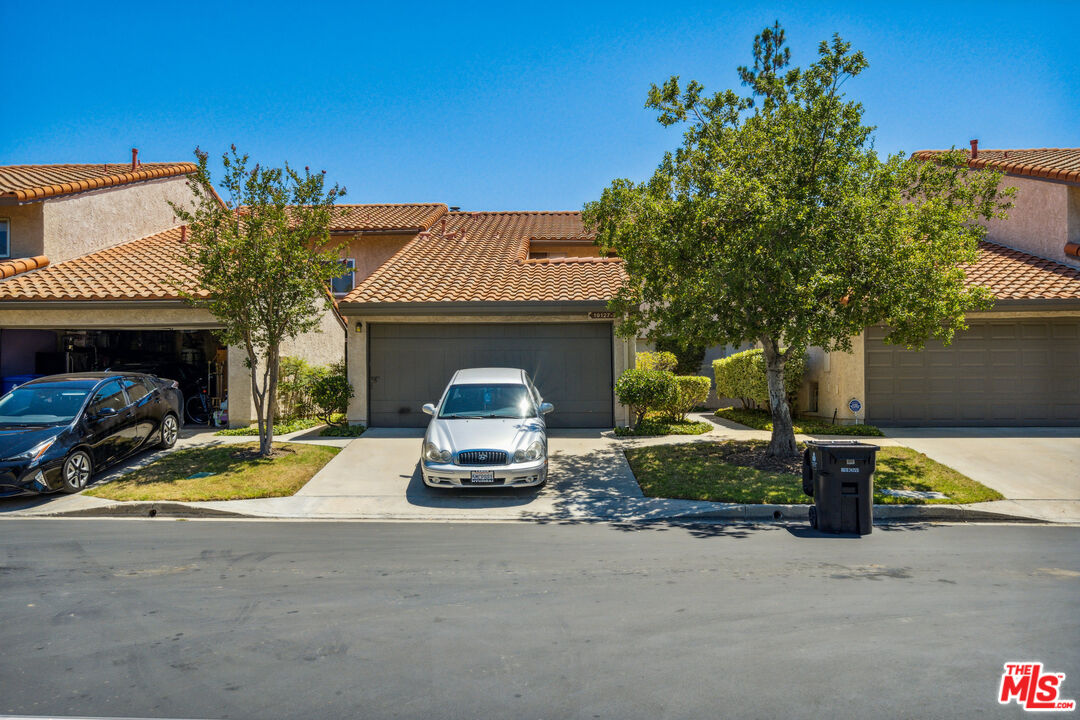 19127 Index Street, Unit 3 Porter Ranch, CA 91326 - Photo 6 of 18 a view of house with outdoor space and porch