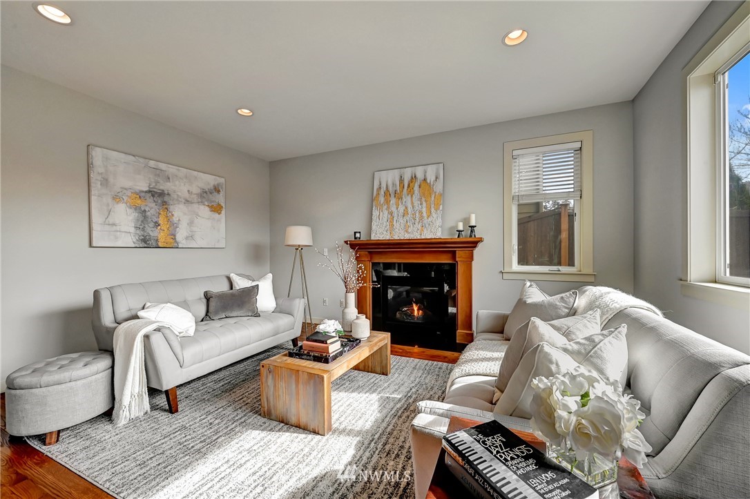 4022 167th Street Southeast Bothell, WA 98012 - Photo 13 of 34 a living room with furniture and a fireplace