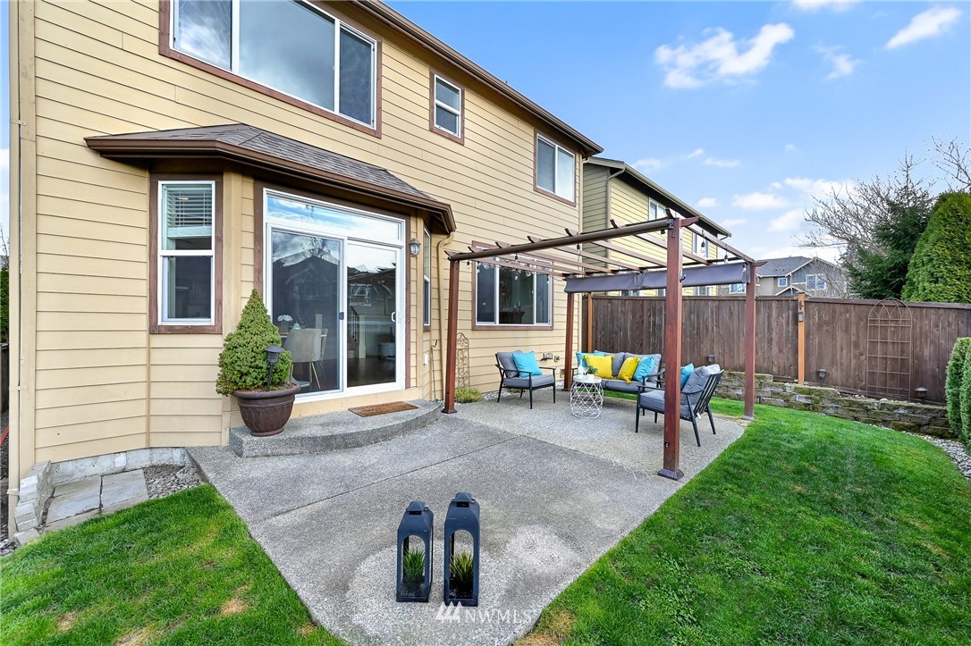4022 167th Street Southeast Bothell, WA 98012 - Photo 15 of 34 a view of a house with backyard and sitting area
