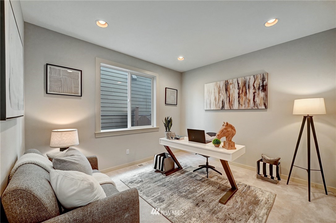 4022 167th Street Southeast Bothell, WA 98012 - Photo 17 of 34 a living room with furniture and a window