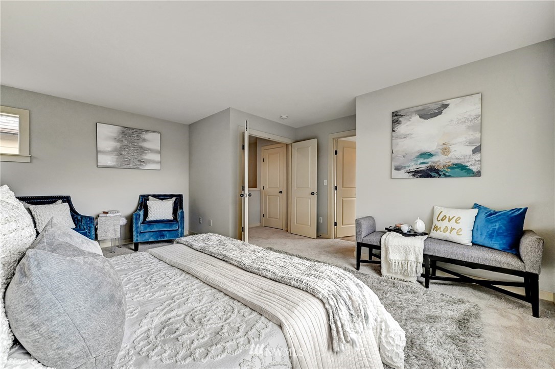 4022 167th Street Southeast Bothell, WA 98012 - Photo 20 of 34 a bedroom with a bed and a couch