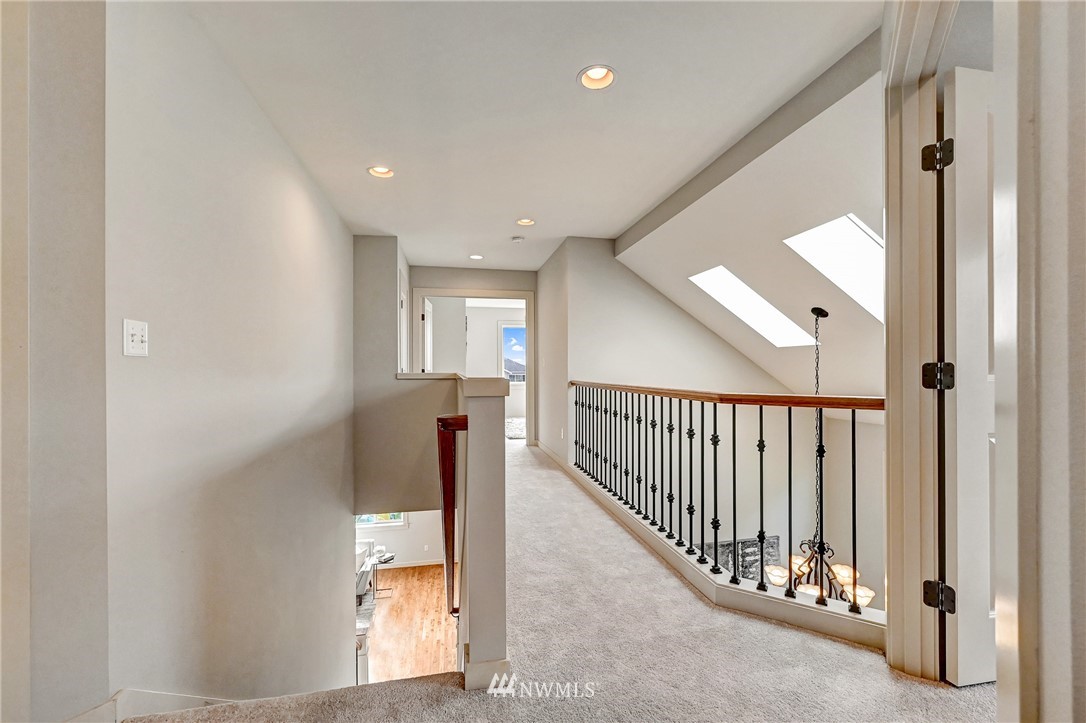 4022 167th Street Southeast Bothell, WA 98012 - Photo 24 of 34 a view of a hallway with windows