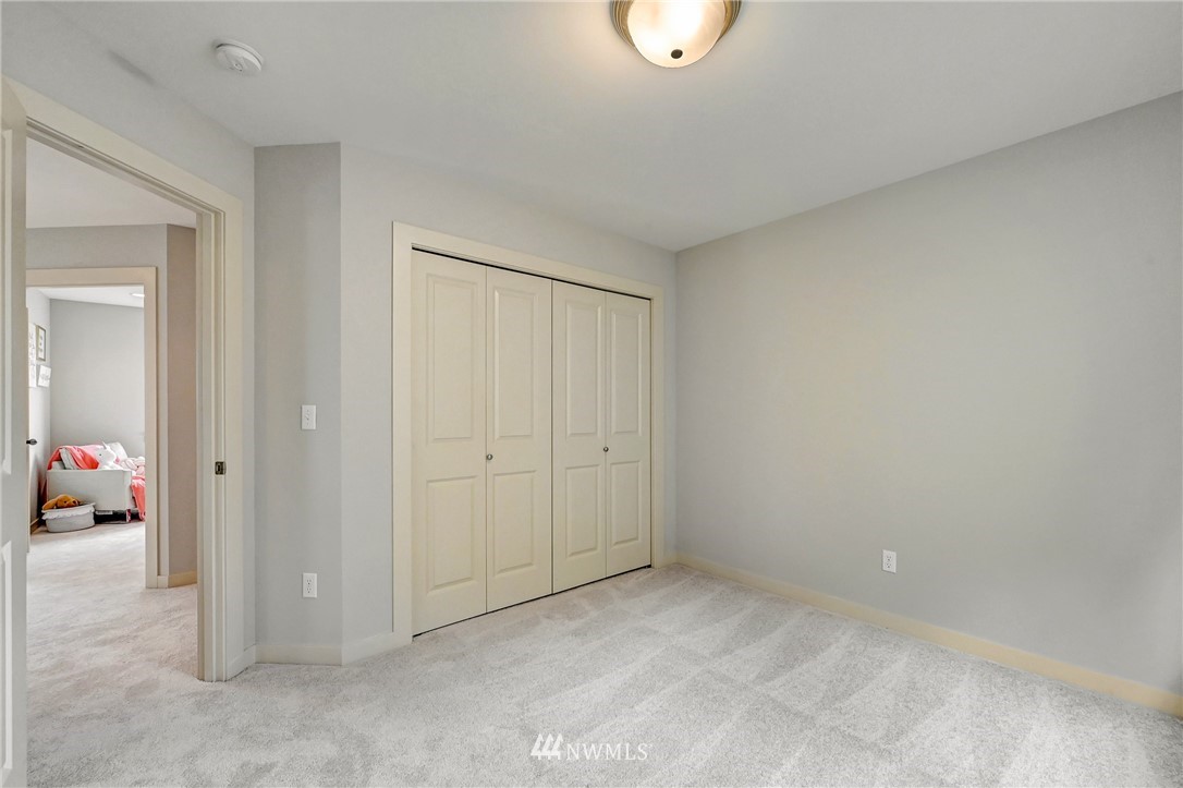 4022 167th Street Southeast Bothell, WA 98012 - Photo 25 of 34 an empty room with windows