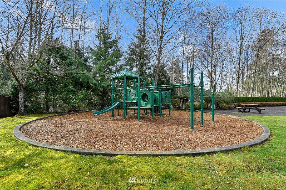 4022 167th Street Southeast Bothell, WA 98012 - Photo 33 of 34 a view of a park with swings