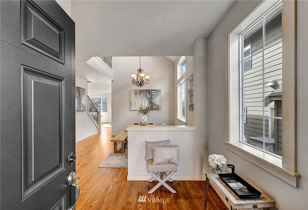 4022 167th Street Southeast Bothell, WA 98012 - Photo 4 of 34 a view of a hallway with furniture and a window