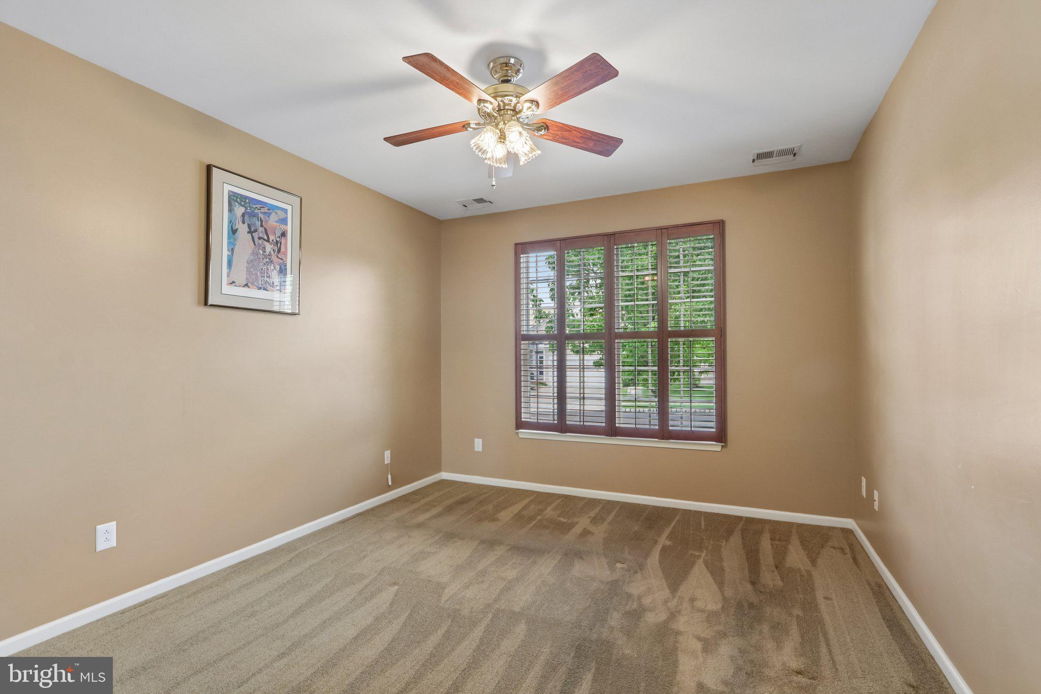 39 Danbury Road Swedesboro, NJ 08085 - Photo 20 of 62 a view of an empty room with a window