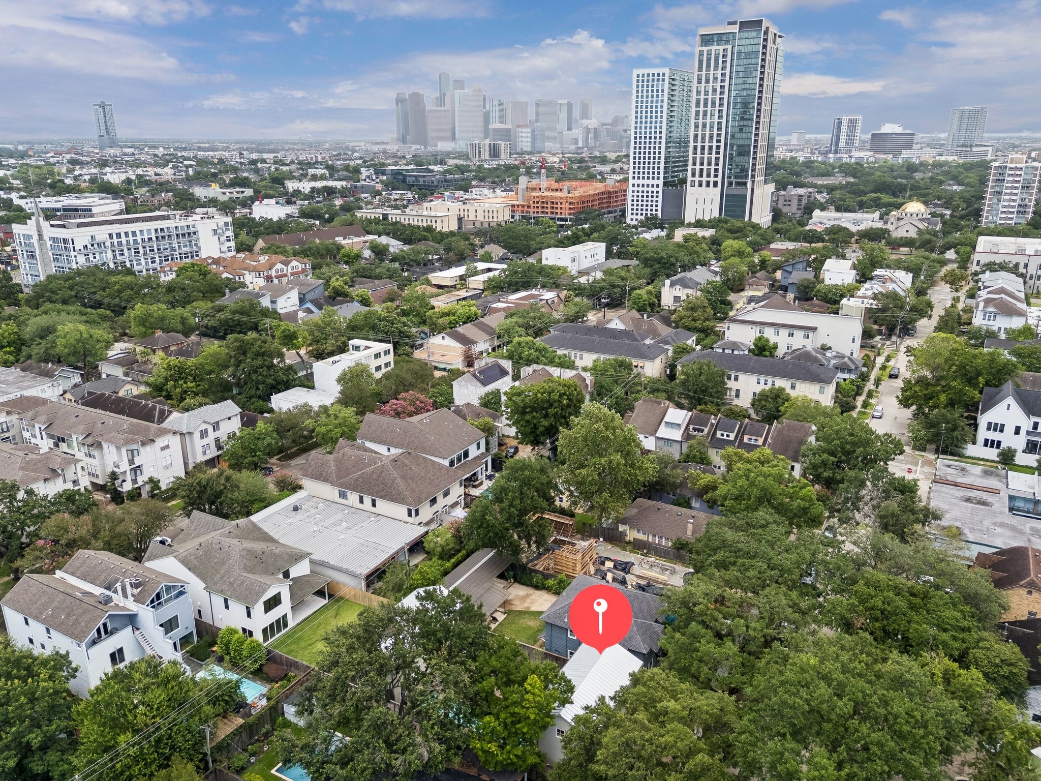 1418 Kipling Street Houston, TX 77006 - Photo 41 of 42 Aerial view with the view of Downtown towards the middle of the photo and the luxury apartment buildings at the edge of this centrally located Montrose neighborhood.