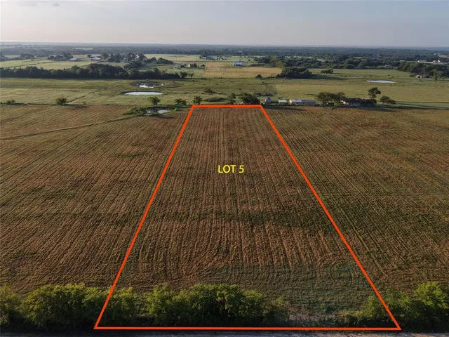 a view of an ocean and city