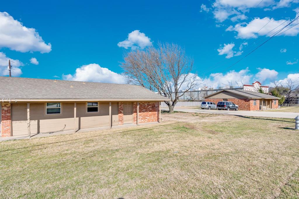 709 George Hopper Road Midlothian, TX 76065 - Photo 10 of 15 a view of a house with a yard