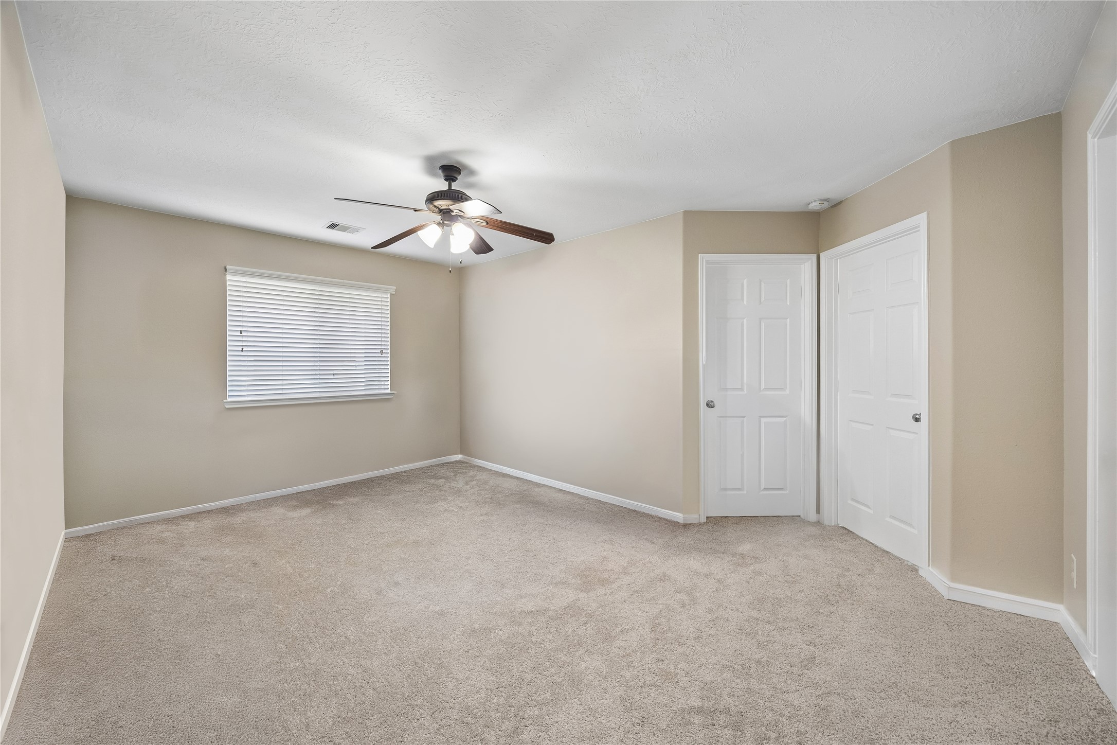 8433 Sunset Loch Drive Spring, TX 77379 - Photo 18 of 25 a view of an empty room with a window