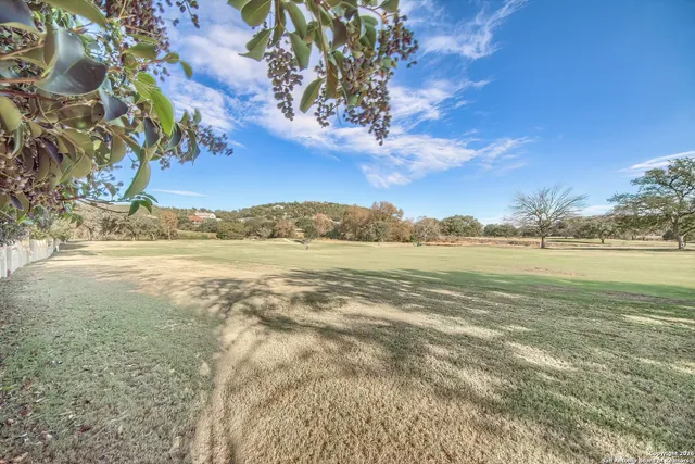 a view of an ocean and a mountain
