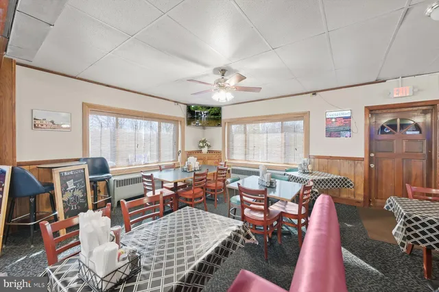 a view of a dining room with furniture