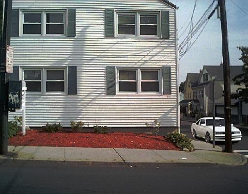 236 Cove Road Stamford, CT 06902 - Photo 1 of 1 a view of a house with a small garden