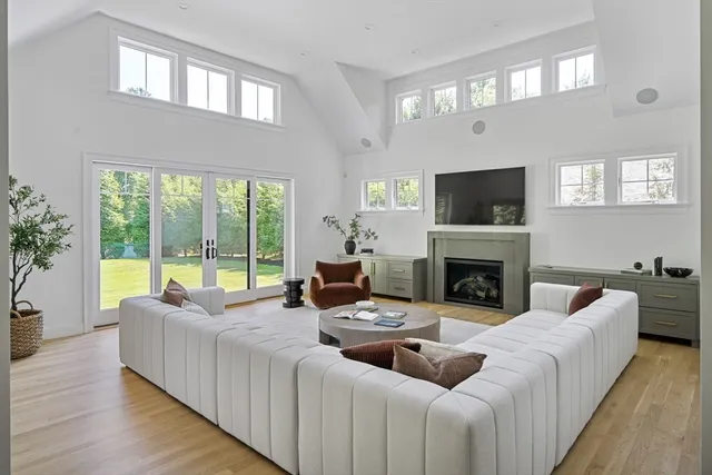 a bathroom with a sink toilet and mirror
