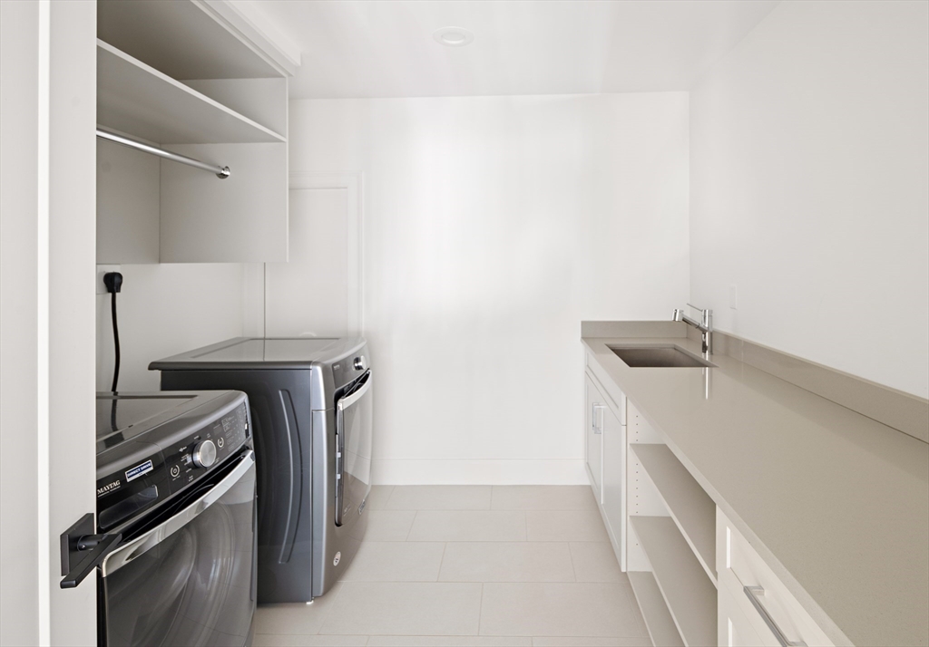 78 Pheasant Landing Road Needham, MA 02492 - Photo 22 of 35 a utility room with dryer and washer