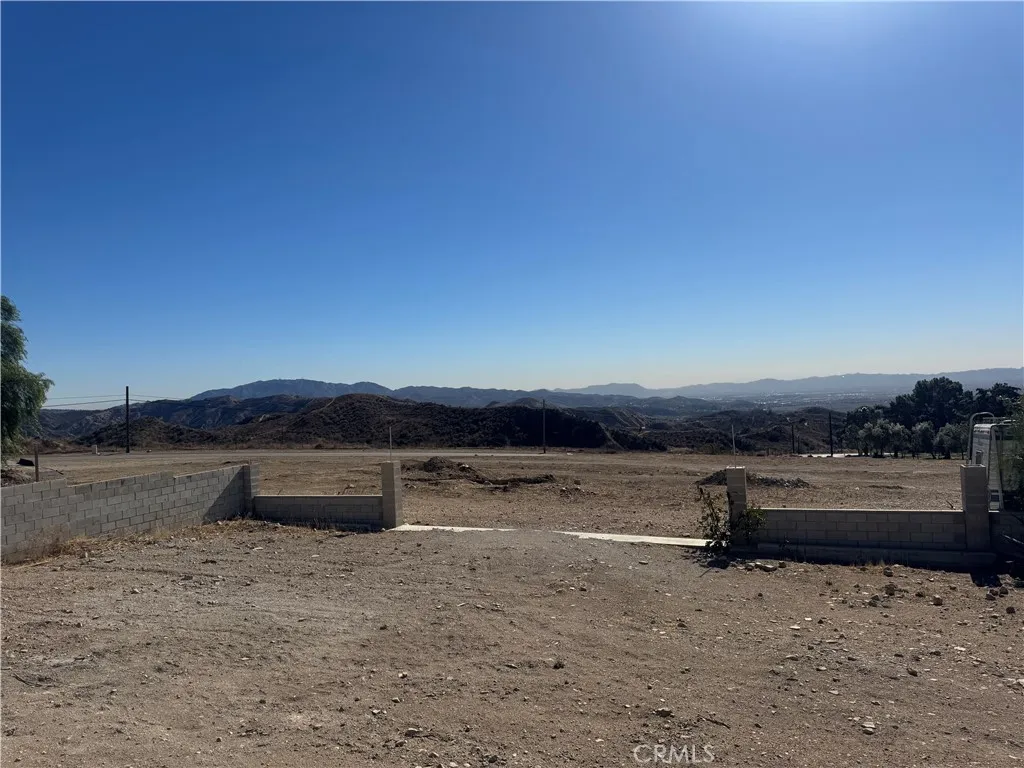 a view of dirt road with a stove