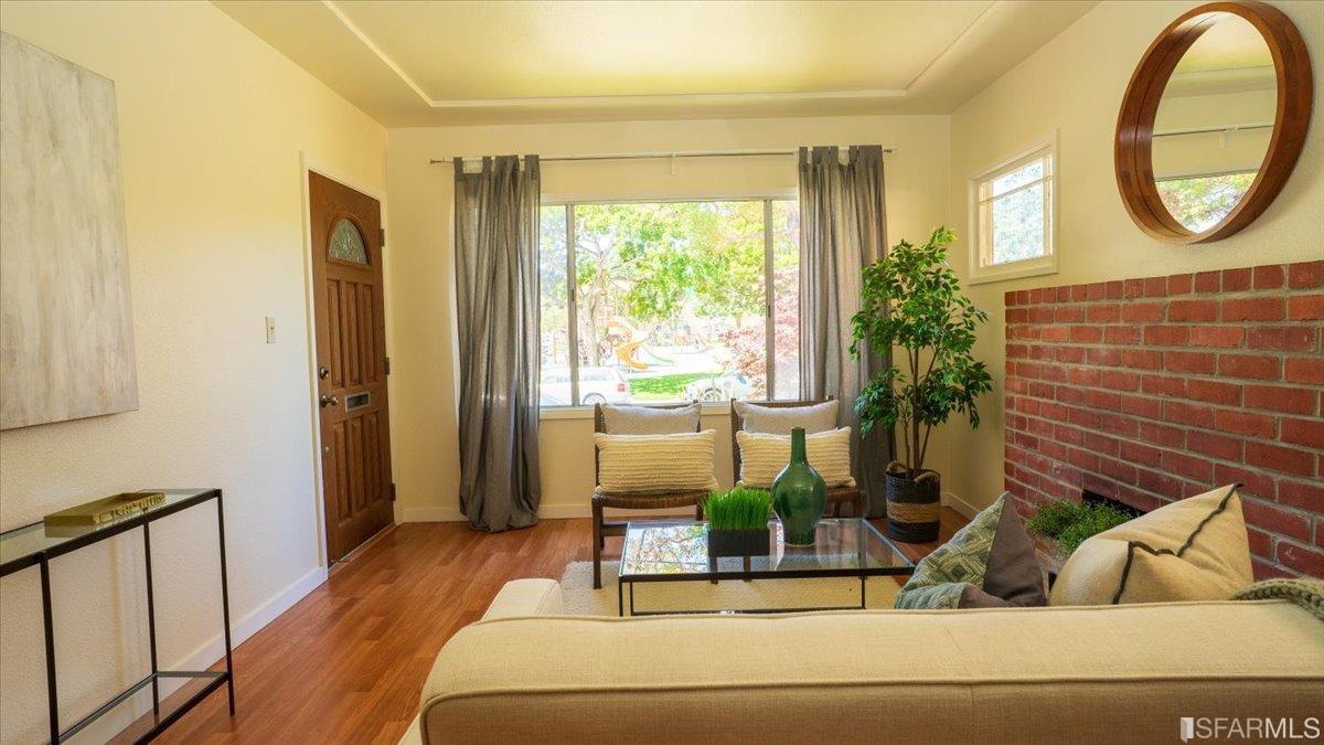 2823 Park Street Berkeley, CA 94702 - Photo 6 of 16 a living room with furniture and a large window