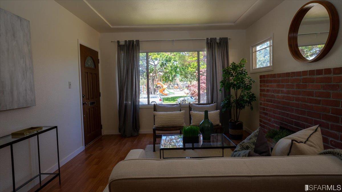 2823 Park Street Berkeley, CA 94702 - Photo 7 of 16 a living room with furniture and a window