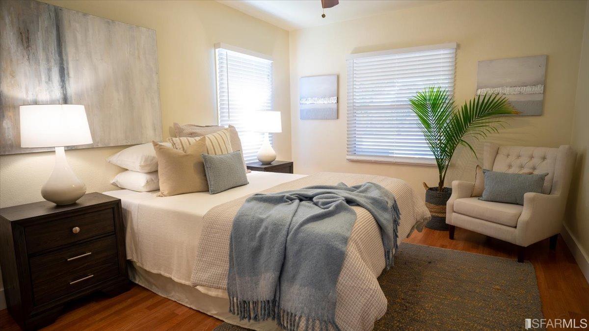 2823 Park Street Berkeley, CA 94702 - Photo 10 of 16 a bedroom with a bed and a couch