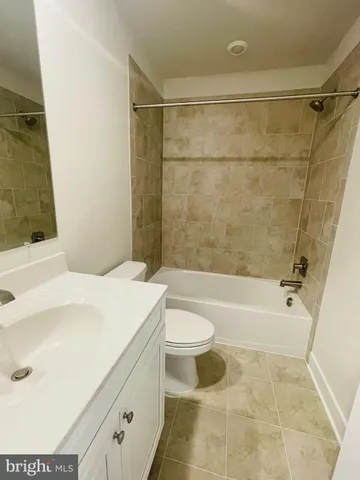 a bathroom with a sink and a bathtub